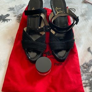 Christian Louboutin shoes.  150